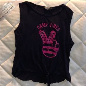 A tank top with camp vibes and a peace sign